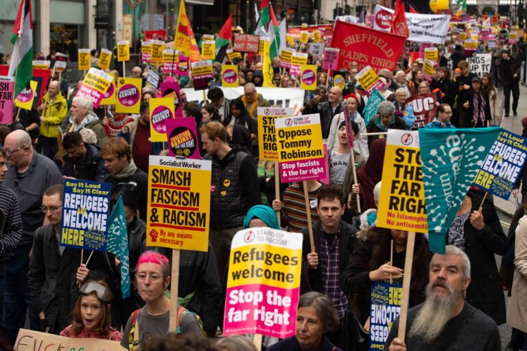 Anti-racists demonstrate against Tommy Robinson supporters